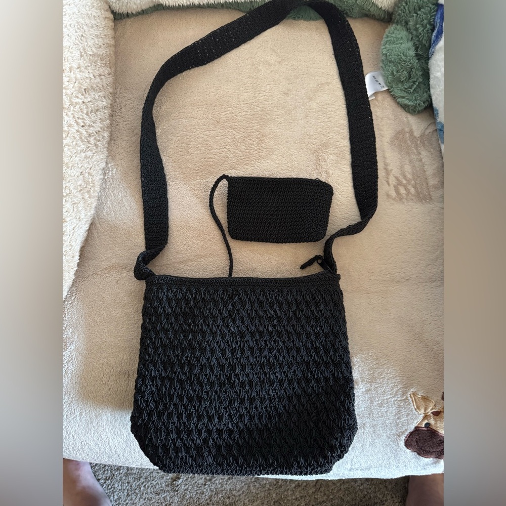 Black macramé purse with zipper and little inside pouch 9 inch times 9 inch